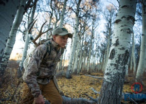 Joey Packing Out his Mule Deer